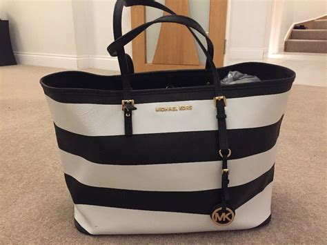 black and white striped michael kors purse|michael kors black leather handbag.